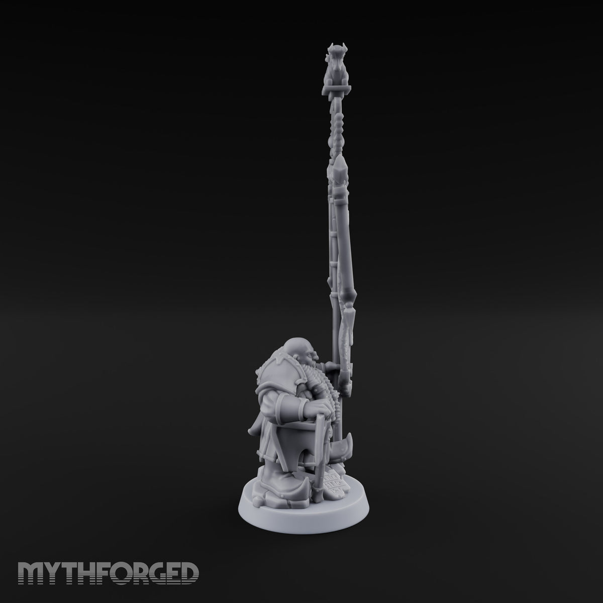 Holding the Standard Dwarf Standard Bearer Miniature for Dungeons and Dragons, Pathfinder or other TTRPGs