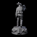 Dressed For The Weather Human Operative Miniature for Dungeons and Dragons, Pathfinder or other TTRPGs