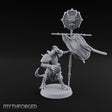 Rags Raised Dragonborn Banner Bearer