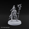 Unbothered by Brambles Elf Druid with Vine Staff and Curved Blade — None · Staff and Sword