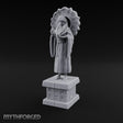 Halo-Backed Glyph-Pedestaled Robed Saint Statue