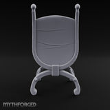 Scholar's Seat Awaits Ornate Cushioned Armchair