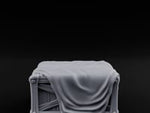 Sheet-Draped Wicker-Framed Covered Storage Crate turntable