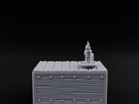 Candle-Topped Rivet-Planked Storage Trunk turntable