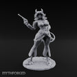 Revolver Raised Smirking Tiefling Gunslinger Miniature for Dungeons and Dragons, Pathfinder or other TTRPGs