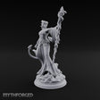 Serpent Staff, Silken Hem Tiefling Female Druid with Serpent-Wrapped Crystal Staff